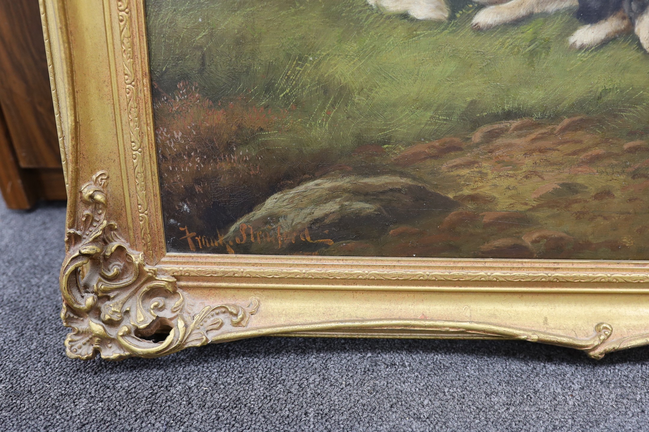English school, oil on canvas, sporting scene of spaniels in landscape, signed, 49 x 59cm